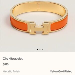 Hermes Gold Tone Hinged Oval Bangle Bracelet